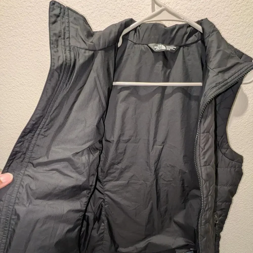 The north face black quilted puffer vest women's sizeM